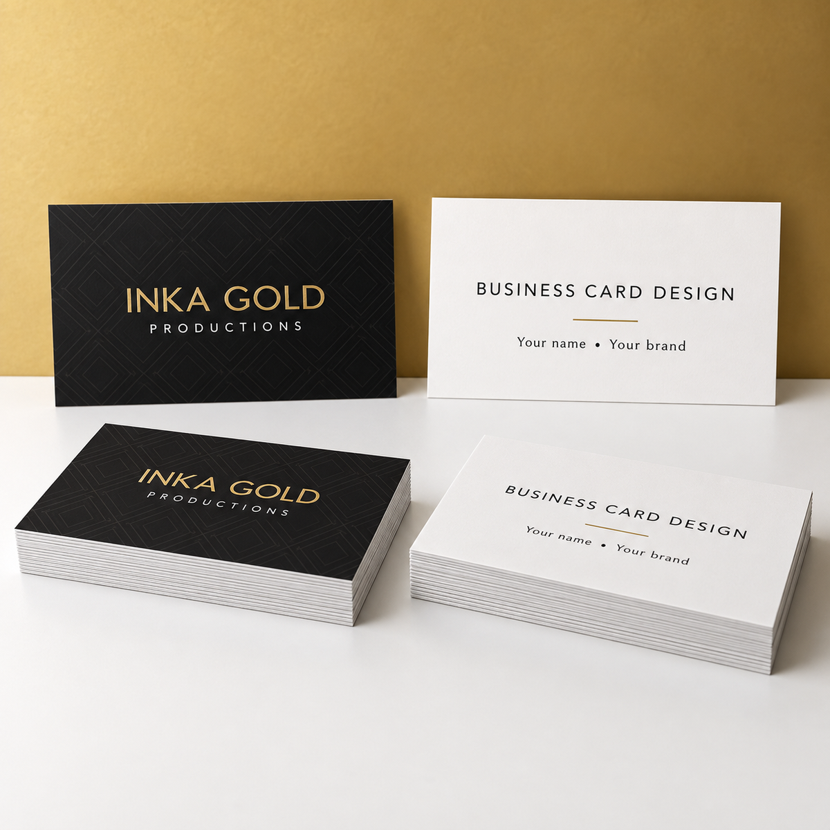 Black and white Inka Gold business card design examples with gold accents