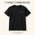 Illustrative black customer-supplied T-shirt with gold YOUR LOGO embroidery on the left chest. Garment not included.