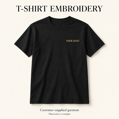 Illustrative black customer-supplied T-shirt with gold YOUR LOGO embroidery on the left chest. Garment not included.